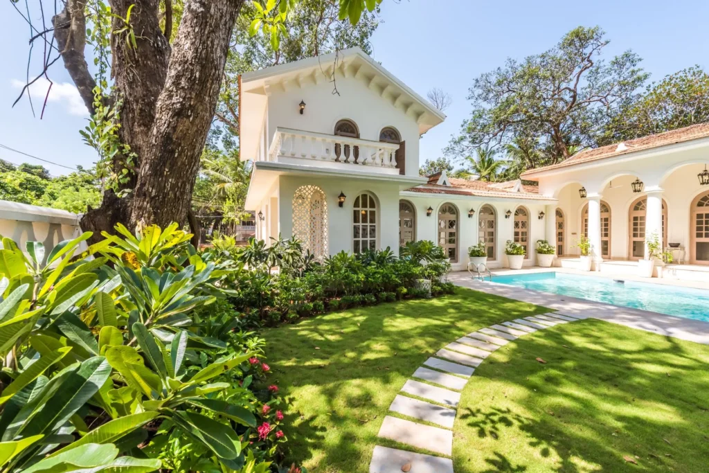 Residential property exterior with garden and pool